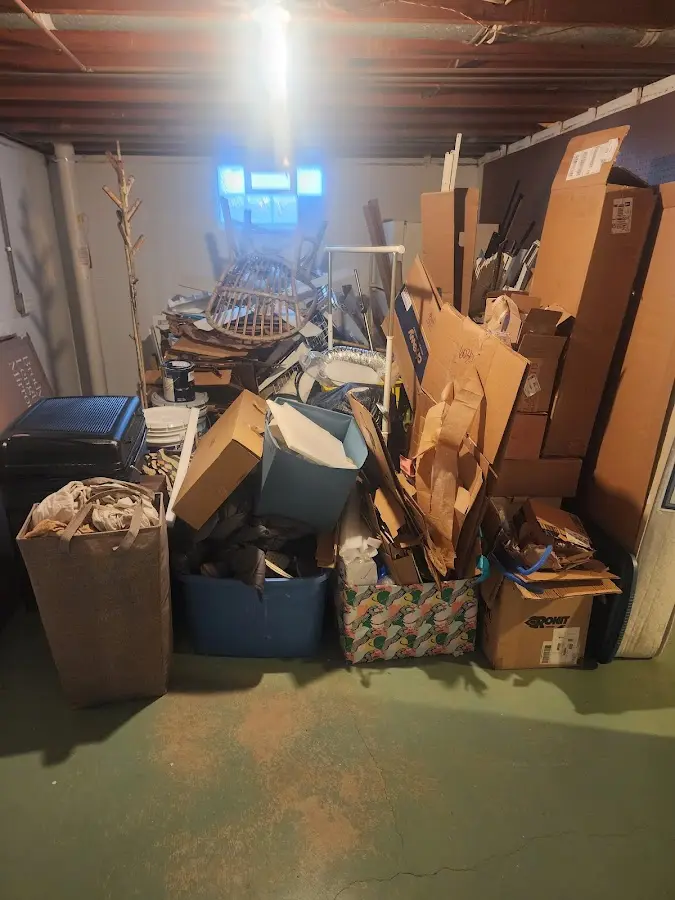 Roll-off dumpster container at job site for Yard Waste Dumpster Rental in Algood